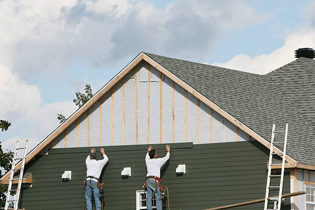 Professional Siding Contractor technician working in Plano, KY